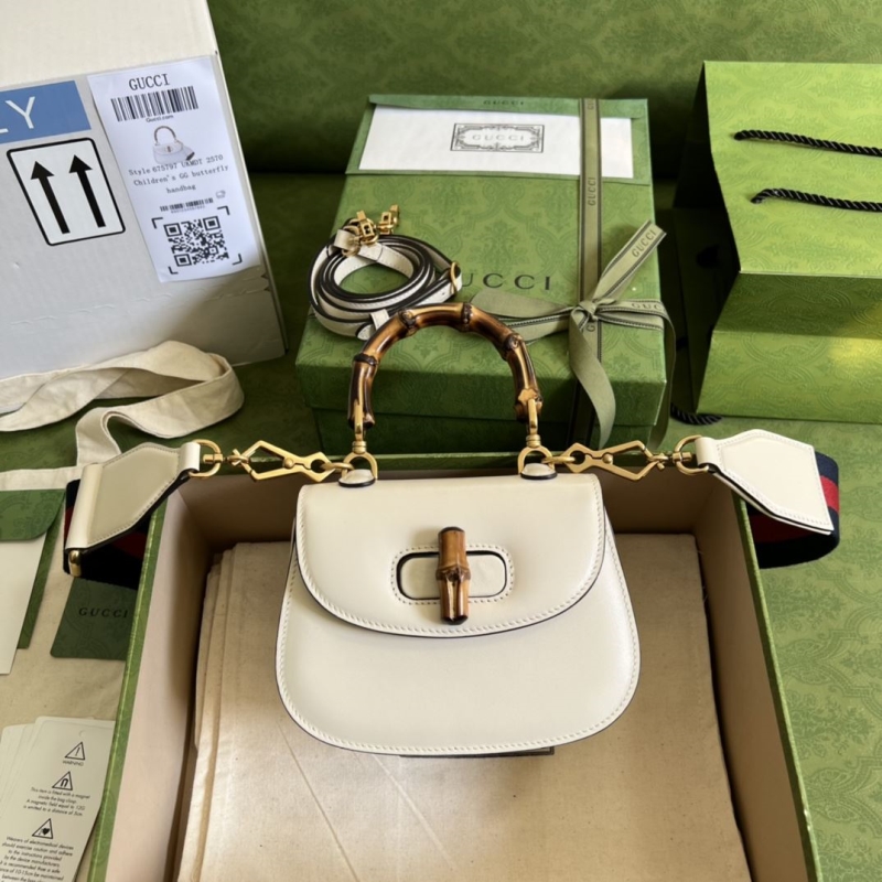 G*u*i top handle bags